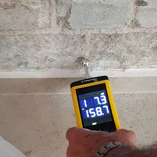 Moisture meter used to check how wet a material is