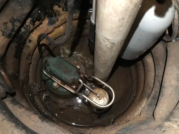 Sump pump in a basement pit