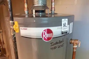 Water leaking from the pipes on top of a water heater