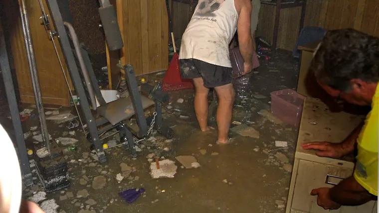 Clearing debris from a flooded lower level